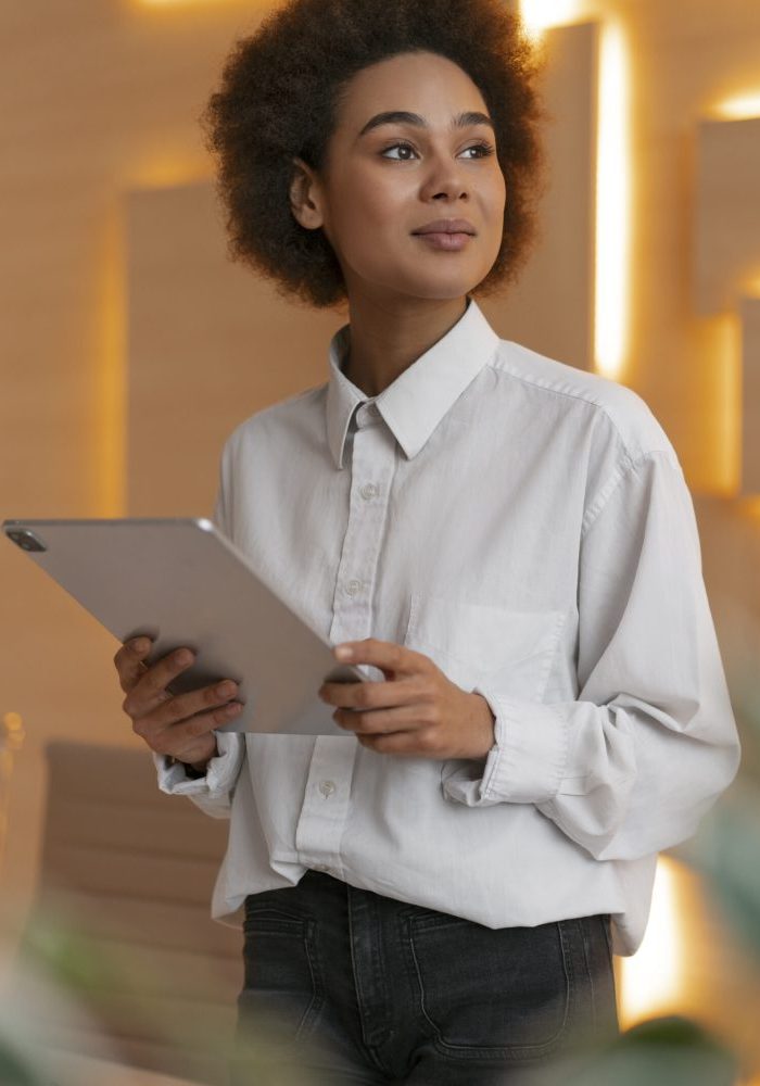 medium-shot-female-economist-holding-tablet-scaled-quxmv5e9g3gtm3u543gnwvl9028ni0v0l4ketqbrps.jpg